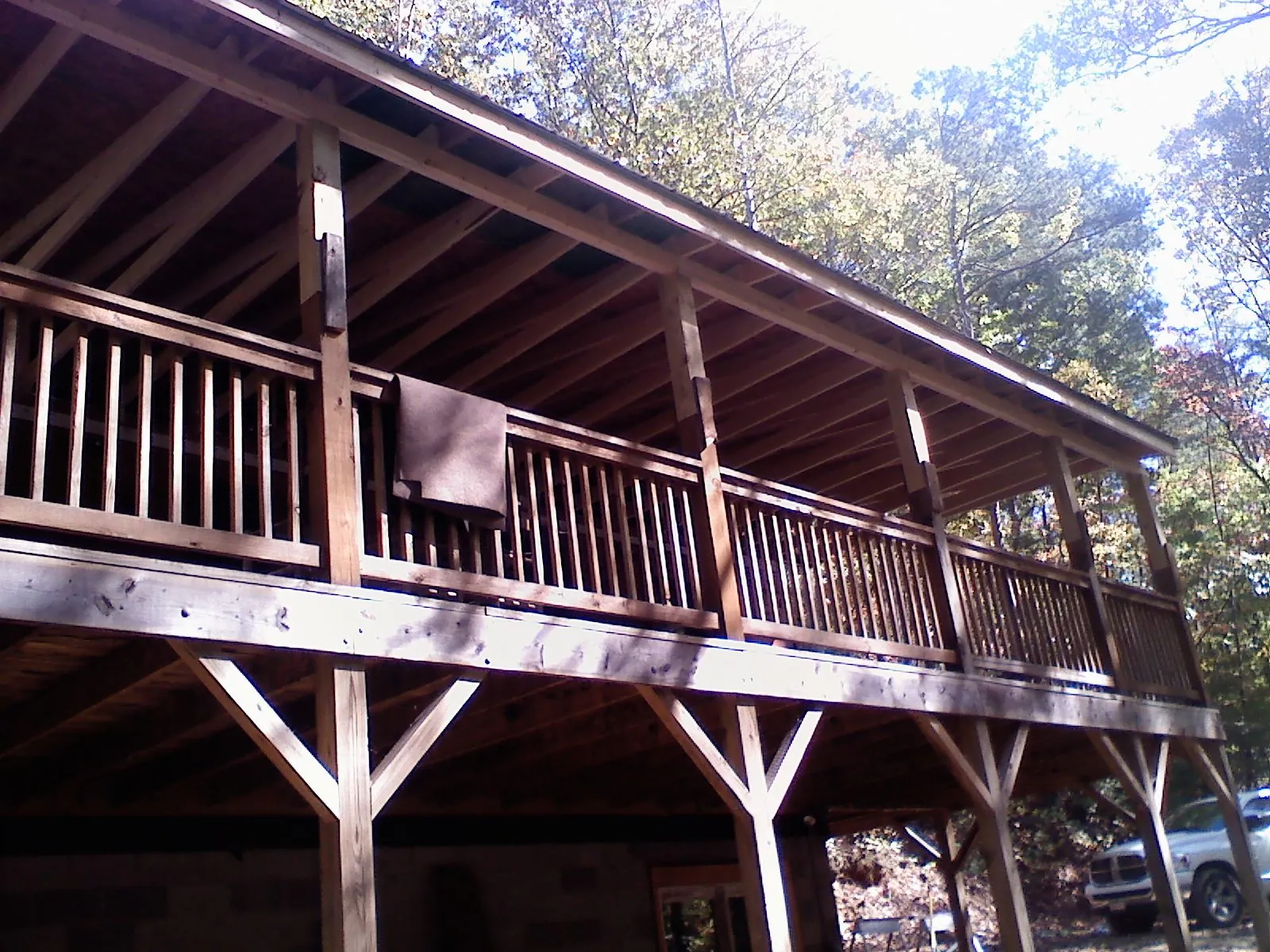 Timber framing under a new elevated porch and deck — Roof Leak Repair in Stacyville by Roofing Brothers